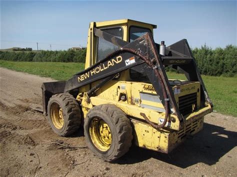 1970 new holland skid steer|new holland l555 for sale.